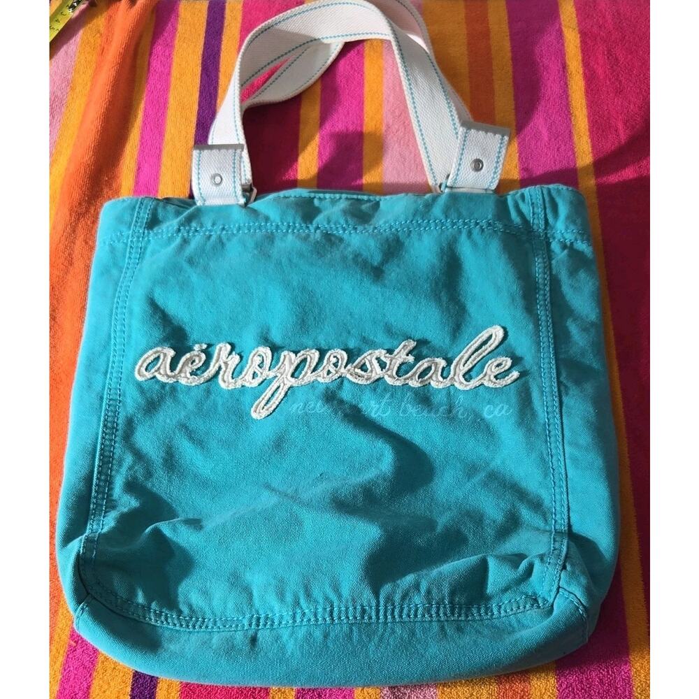 Aéropostale Turquoise Tote Bag with Embroidered Accent and White Handles